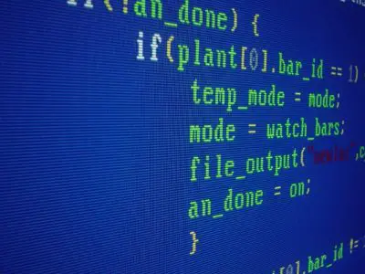 Systems programming code on a monitor, illustrating hands-on project work