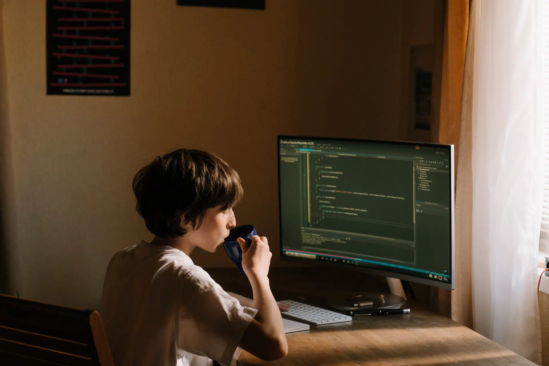 Developer writing graph traversal algorithm code on a laptop