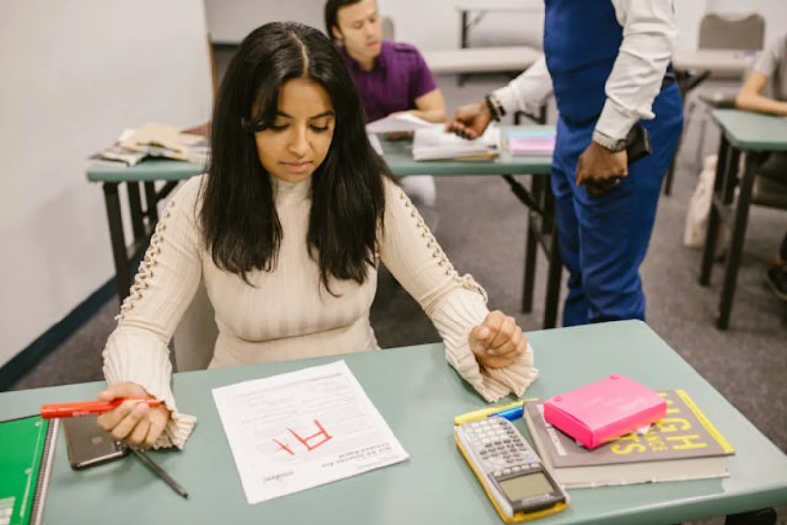 student looking at her grade