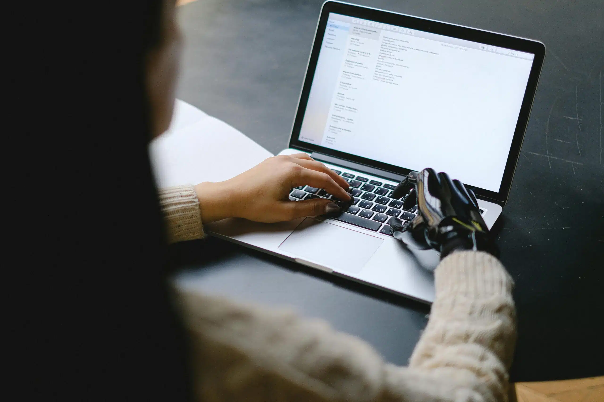 A student comparing human expert help versus AI-generated code on a laptop screen
